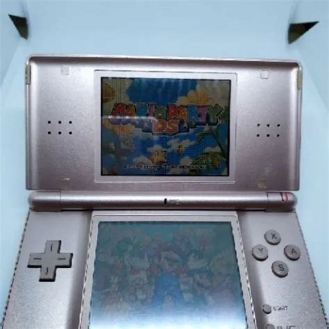 Original Nintendo DS Lite with Many Games .